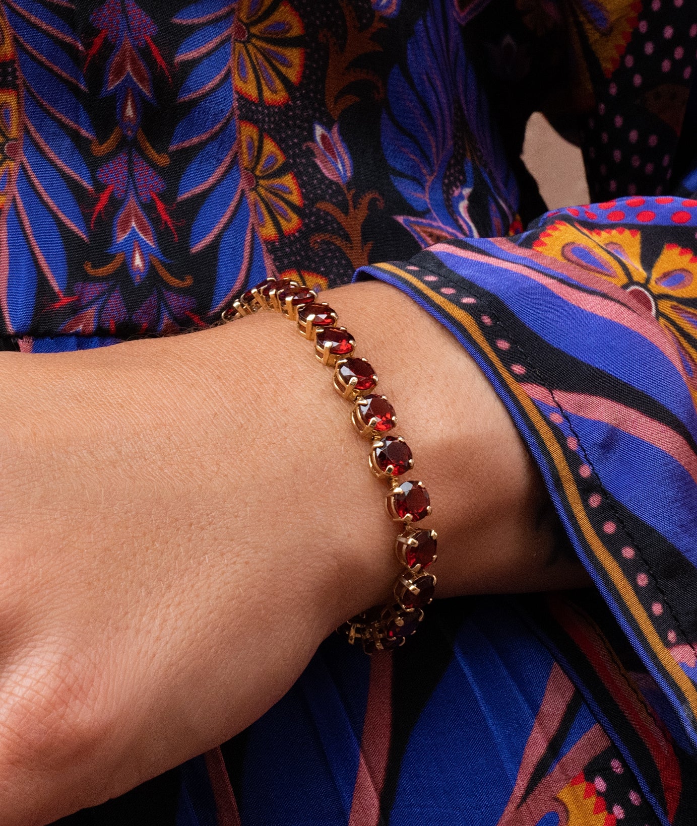 Garnet Tennis bracelet in 14K Yellow Gold