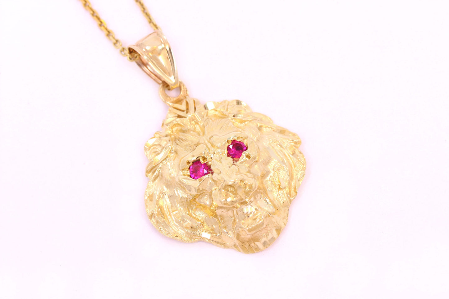 Ruby Eyed Lion's Head Pendant in 14K Yellow Gold